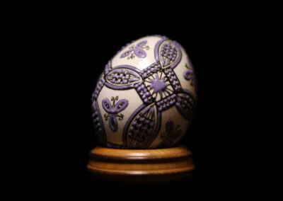 Purple painted pysanky egg